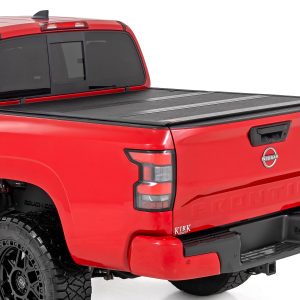 Rough Country Hard Low Profile Bed Cover 5′ Bed w/Cargo Mgmt Nissan Frontier (22-26)