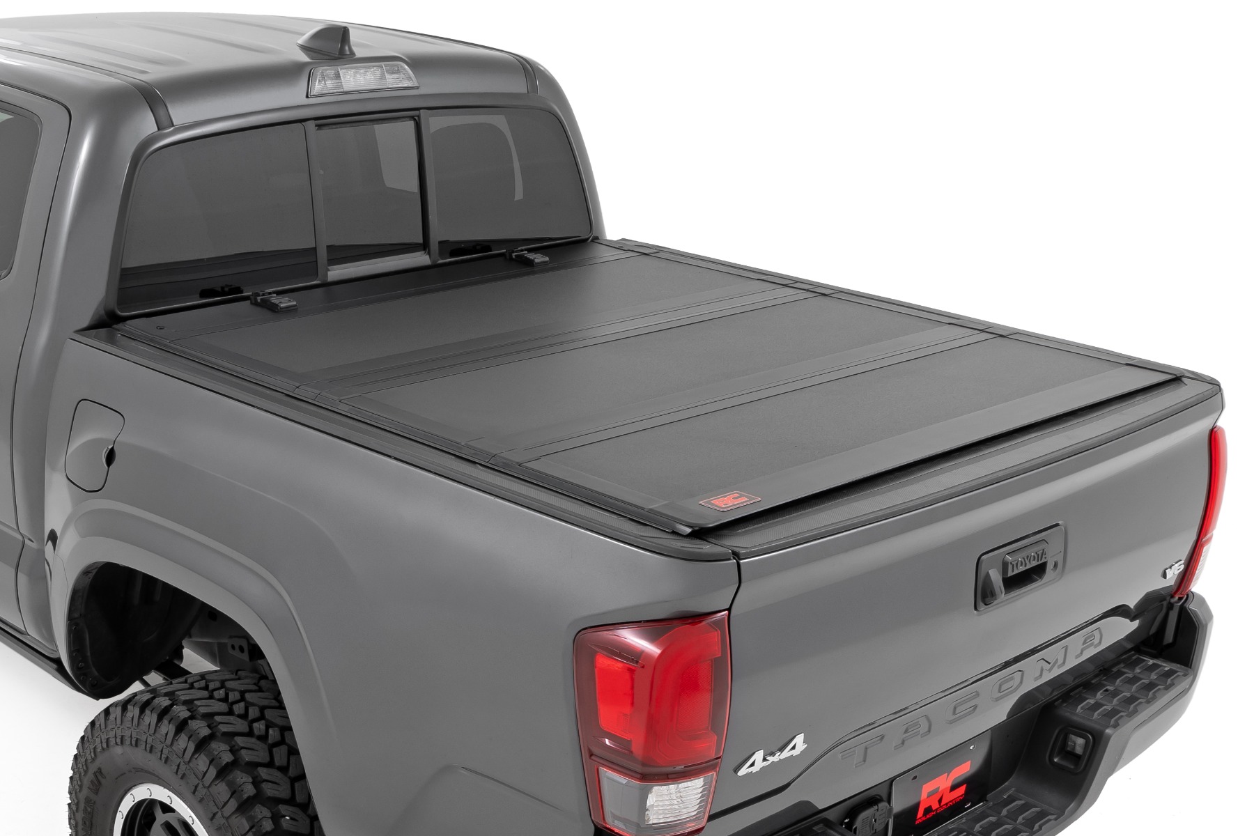 Rough Country Hard Tri-Fold Flip Up Bed Cover 6′ Bed Toyota Tacoma 2WD/4WD (2016-2023)