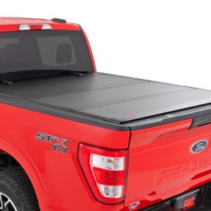 Rough Country Hard Tri-Fold Flip Up Bed Cover 5’7″ Bed Ford F-150 2WD/4WD (2015-2020)