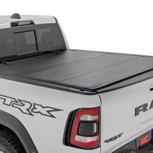 Rough Country Hard Tri-Fold Flip Up Fold Bed Cover 5’7″ Bed Ram 1500 (19-26)/1500 TRX (21-24)