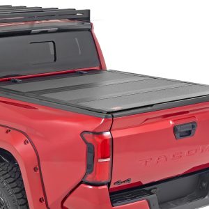 Rough Country Hard Tri-Fold Flip Up Bed Cover 5′ Bed Toyota Tacoma 2WD/4WD (2024-2026)